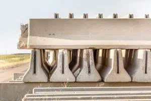 concrete-parts-piled-up-besides-rural-road-besides-highway