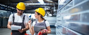 factory-workers-working-together-industrial-production-hall-hero-image