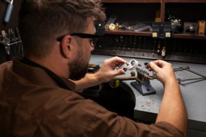 medium-shot-jeweler-making-jewellery