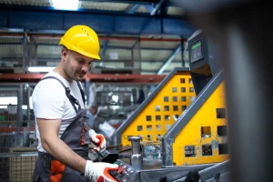 portrait-factory-worker-working-industrial-machine-production-plant
